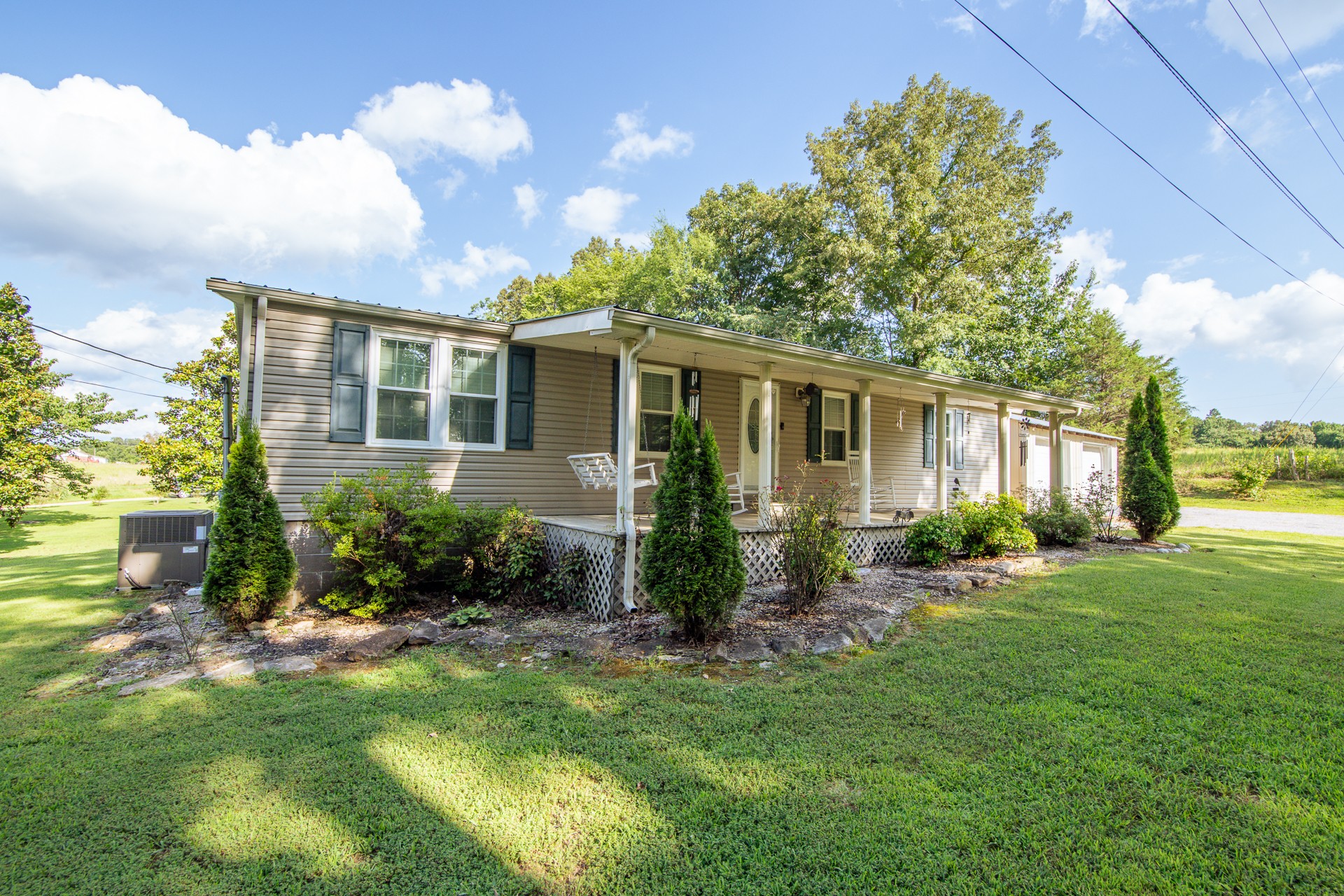 3130 Nance Bend Road Clifton, TN 38425 - Photo 2 of 76 a view of a house with backyard and garden