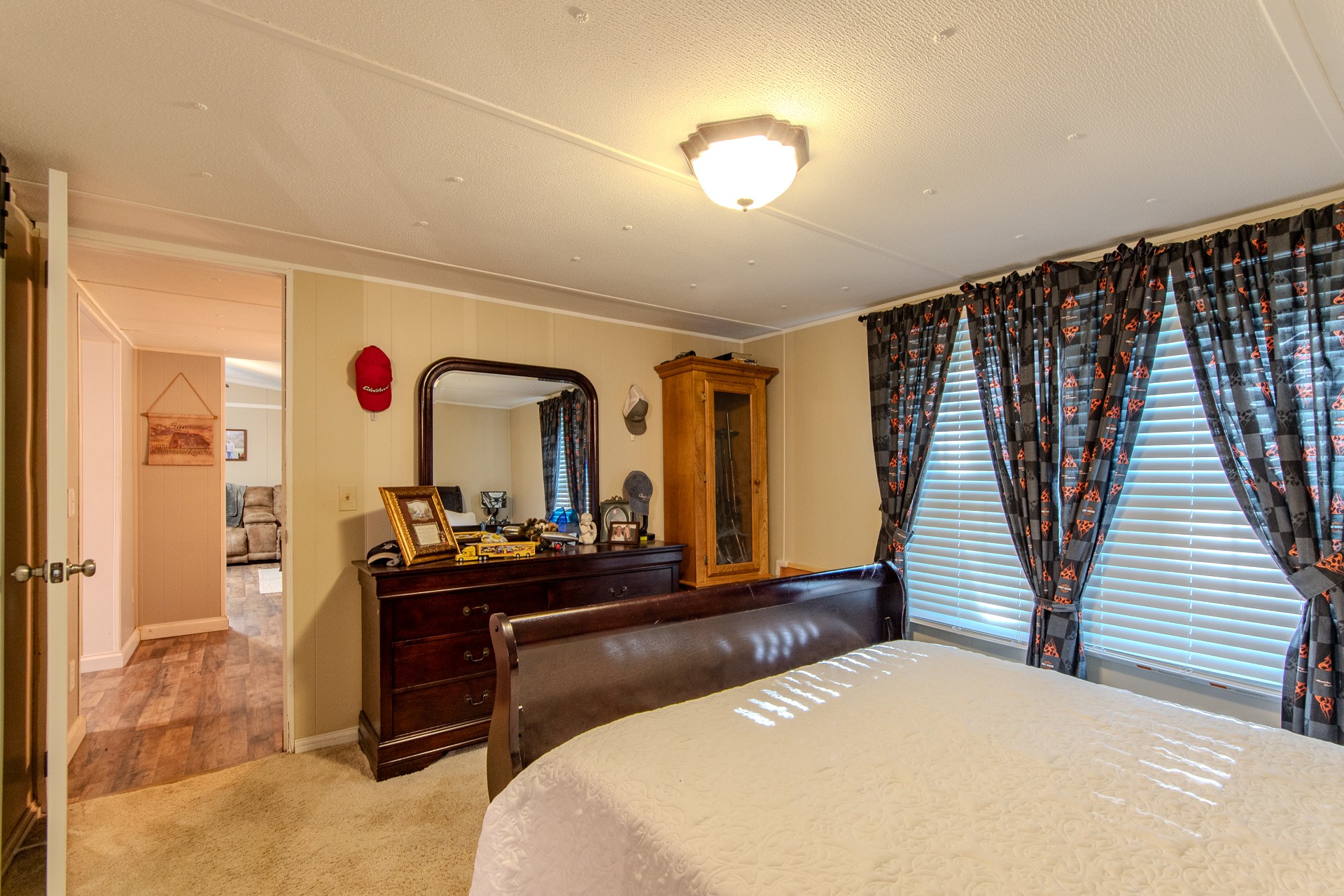 3130 Nance Bend Road Clifton, TN 38425 - Photo 36 of 76 a bedroom with a bed and a dresser