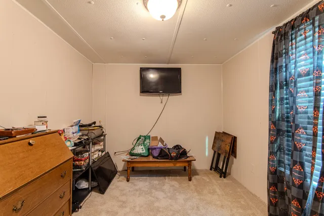 a view of a car garage of the house