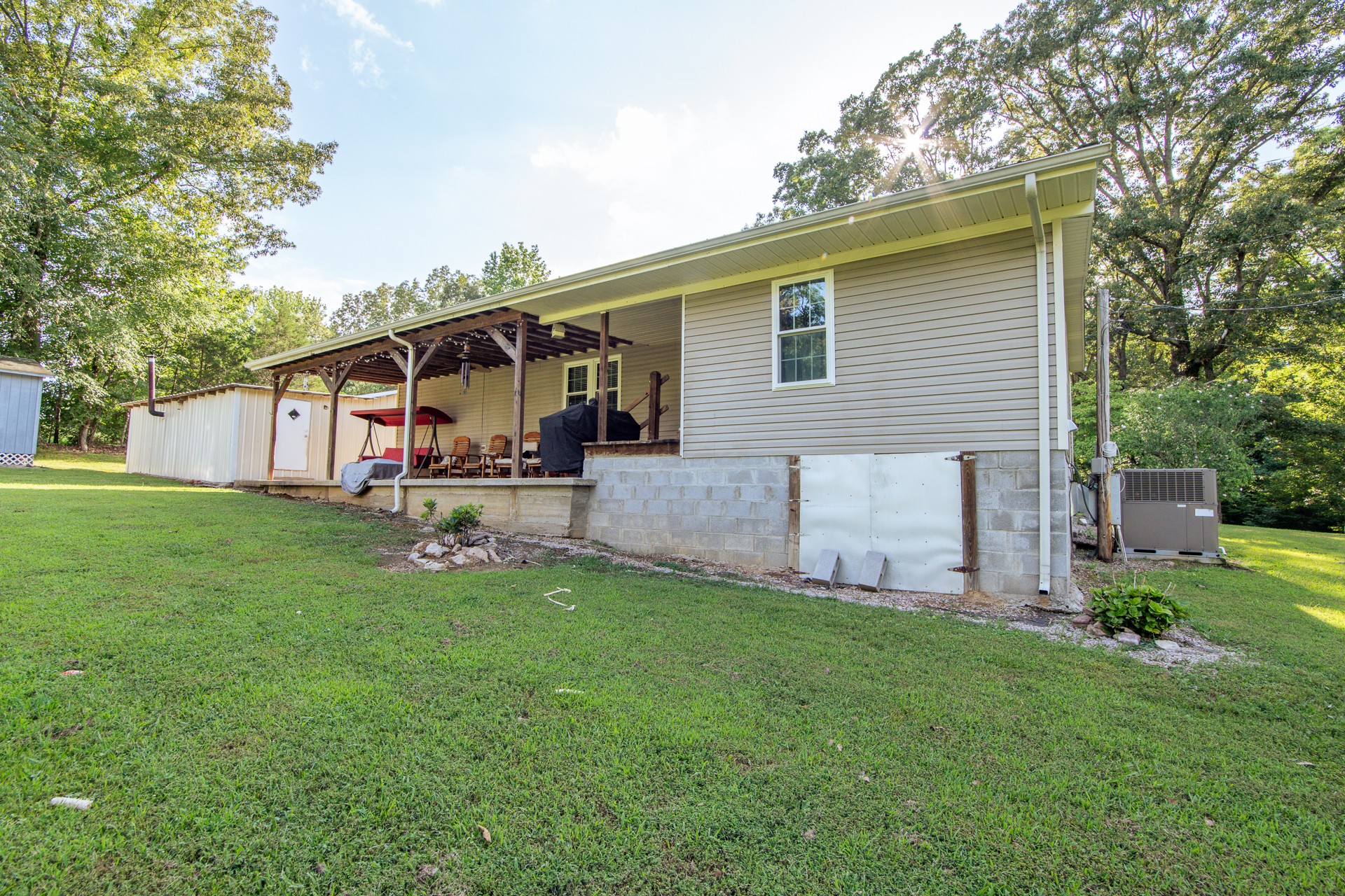 3130 Nance Bend Road Clifton, TN 38425 - Photo 53 of 76 a front view of house with yard and seating area