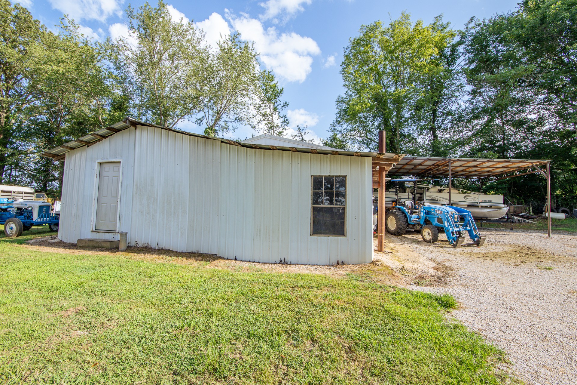 3130 Nance Bend Road Clifton, TN 38425 - Photo 56 of 76 a view of a car garage of the house