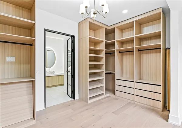 a living room with a large bed and a large window