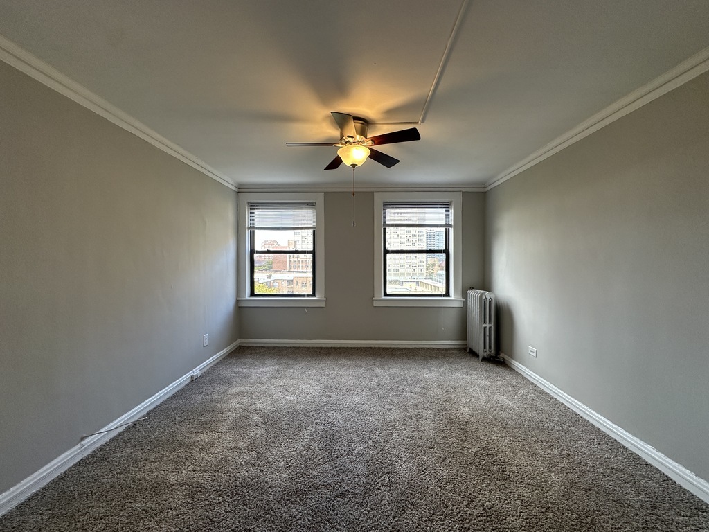661 West Sheridan Road, Unit 601 Chicago, IL 60613 - Photo 7 of 20 a view of an empty room with a window
