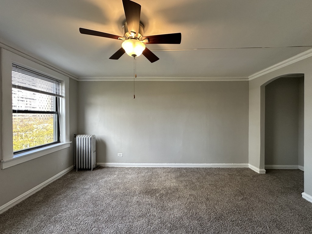 661 West Sheridan Road, Unit 601 Chicago, IL 60613 - Photo 9 of 20 a view of an empty room with a window