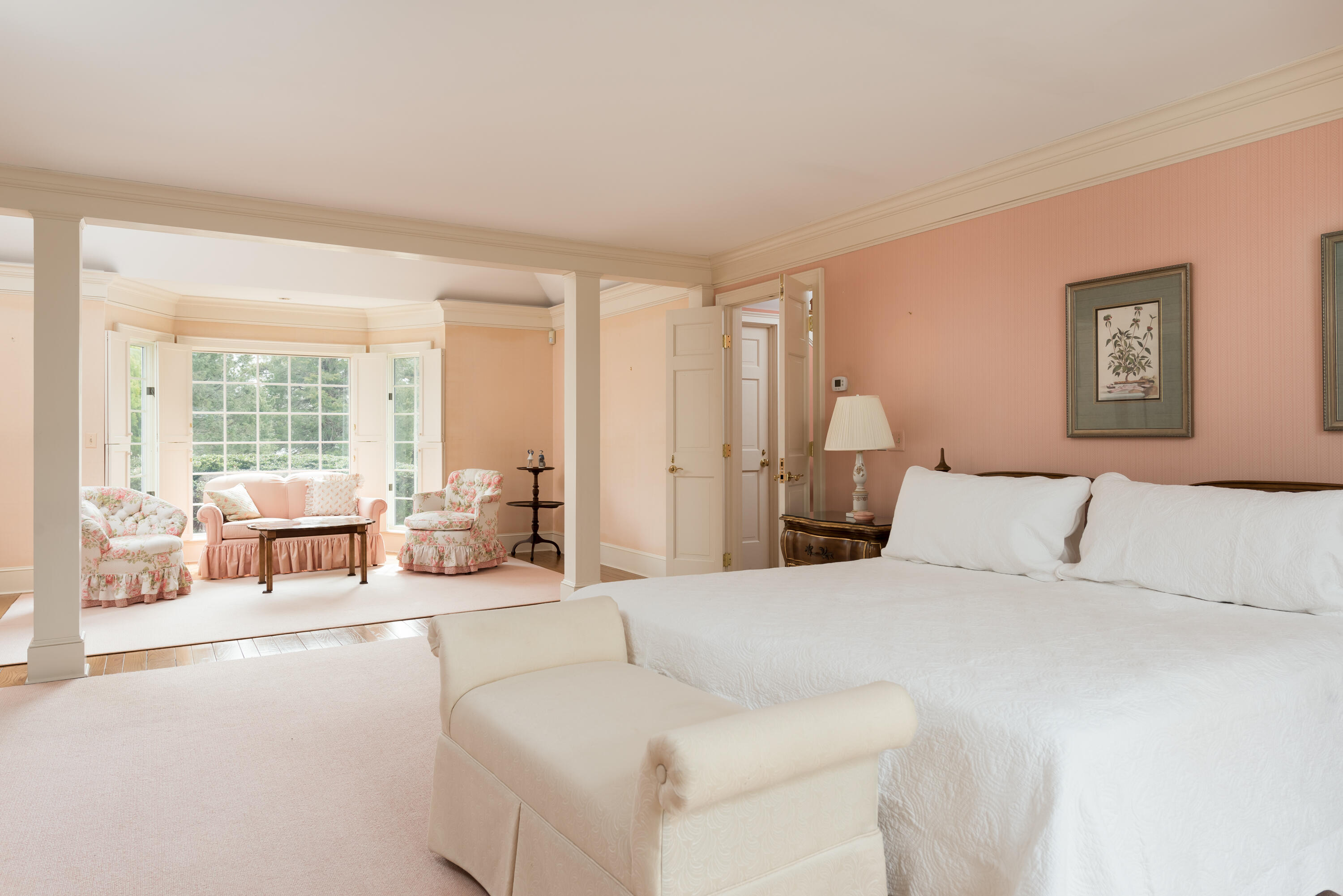 100 Ice Valley Road Osterville, MA 02655 - Photo 15 of 22 a living room with a large bed couch and a large window with outer view