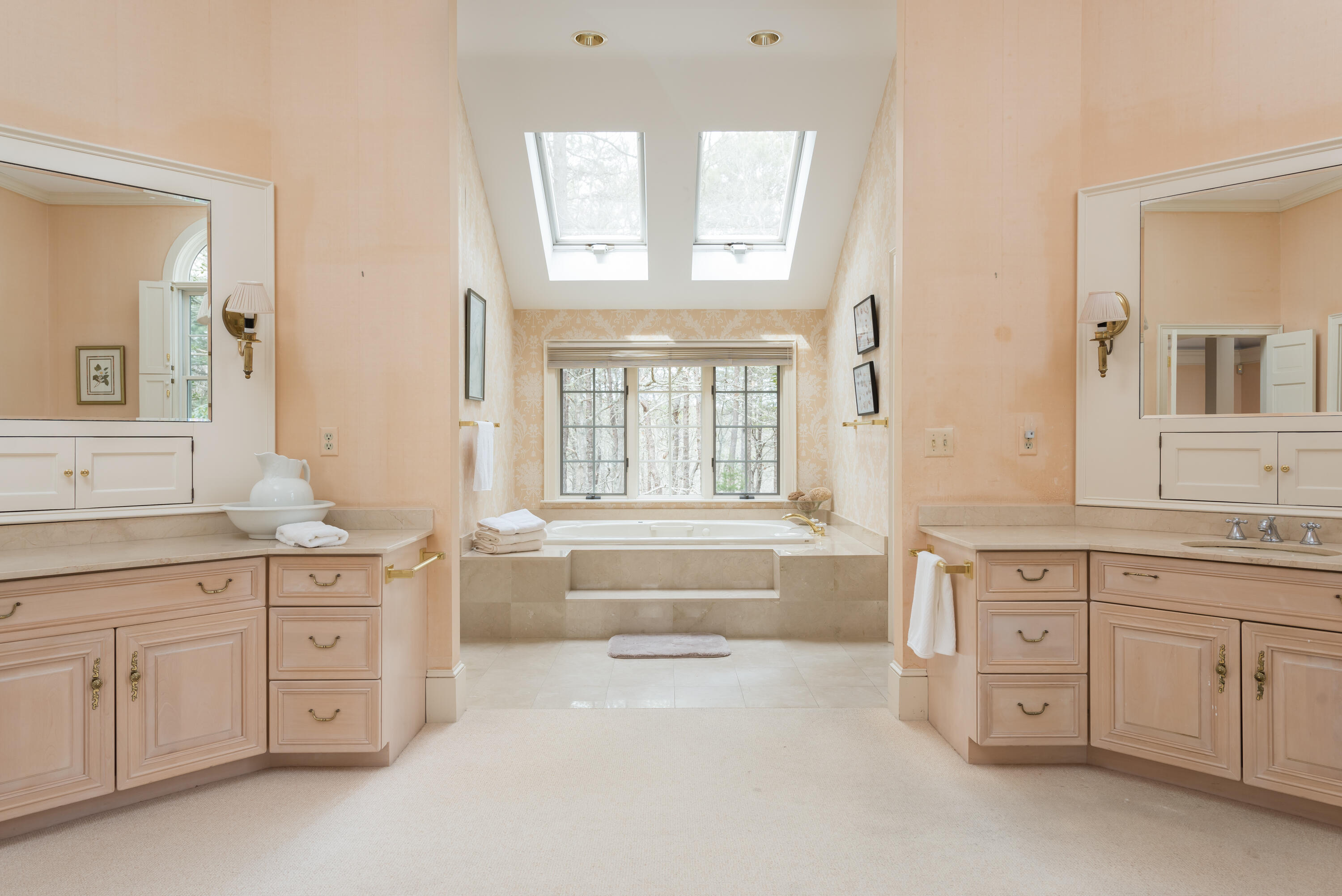 100 Ice Valley Road Osterville, MA 02655 - Photo 17 of 22 a spacious bathroom with a granite countertop tub sink and mirror