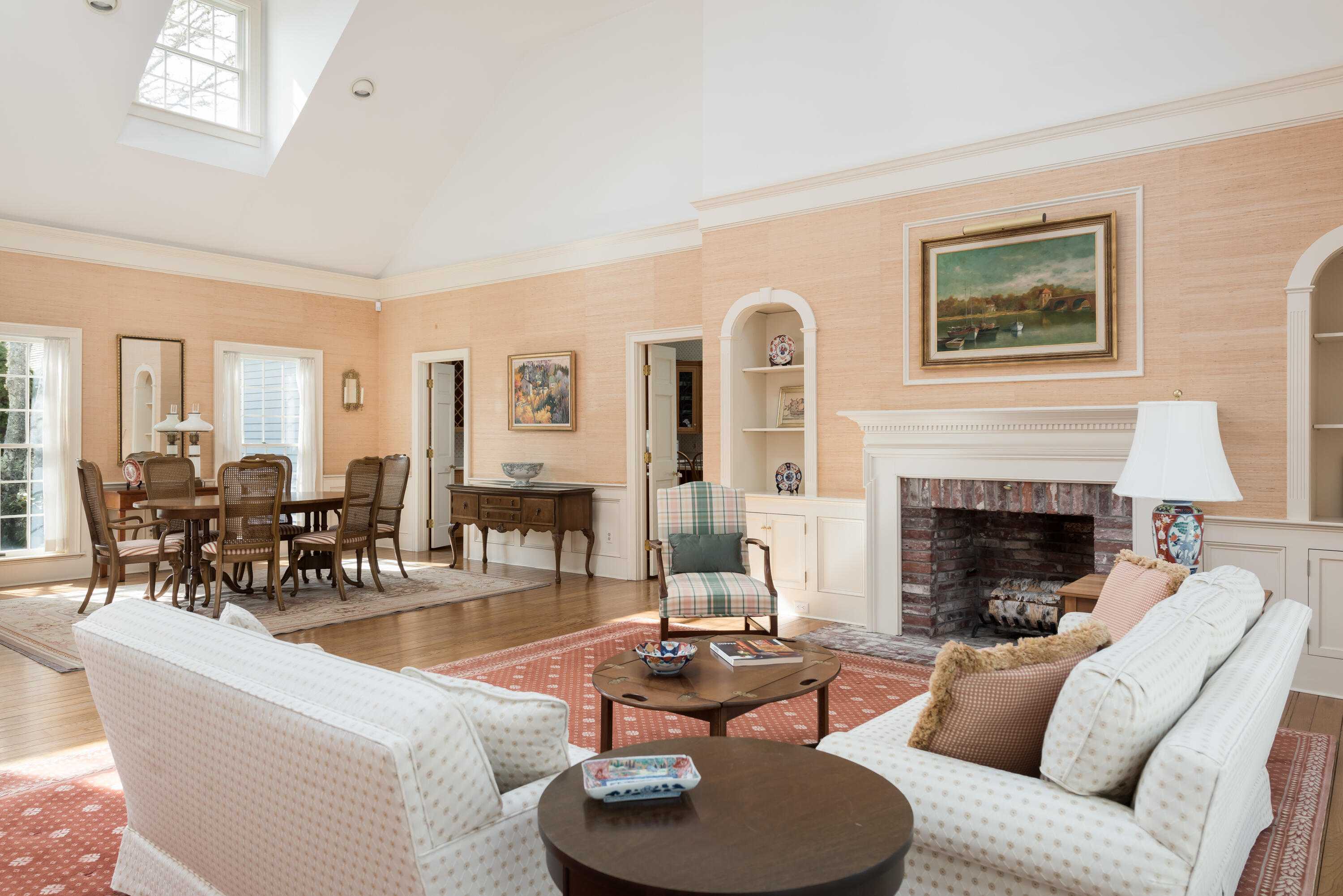 100 Ice Valley Road Osterville, MA 02655 - Photo 5 of 22 a living room with furniture and a fireplace