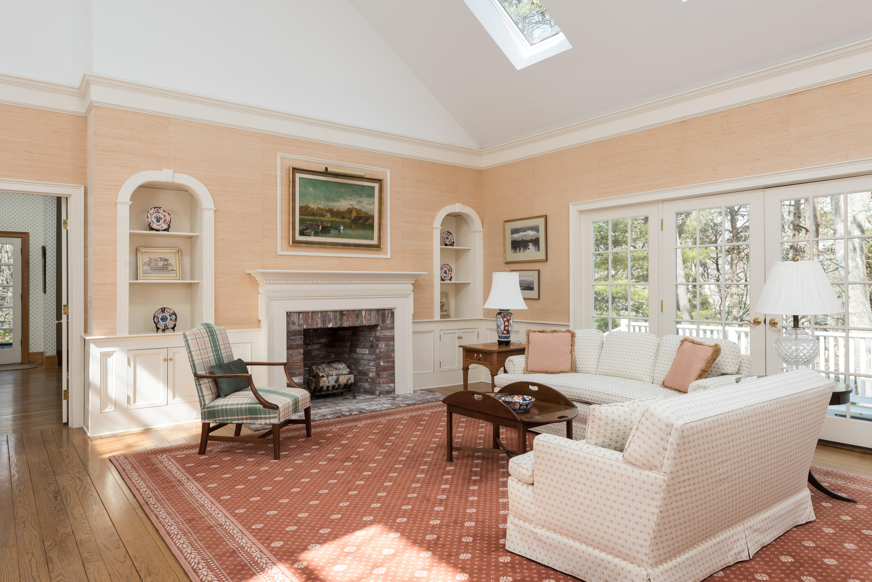 100 Ice Valley Road Osterville, MA 02655 - Photo 6 of 22 a living room with furniture and a fireplace