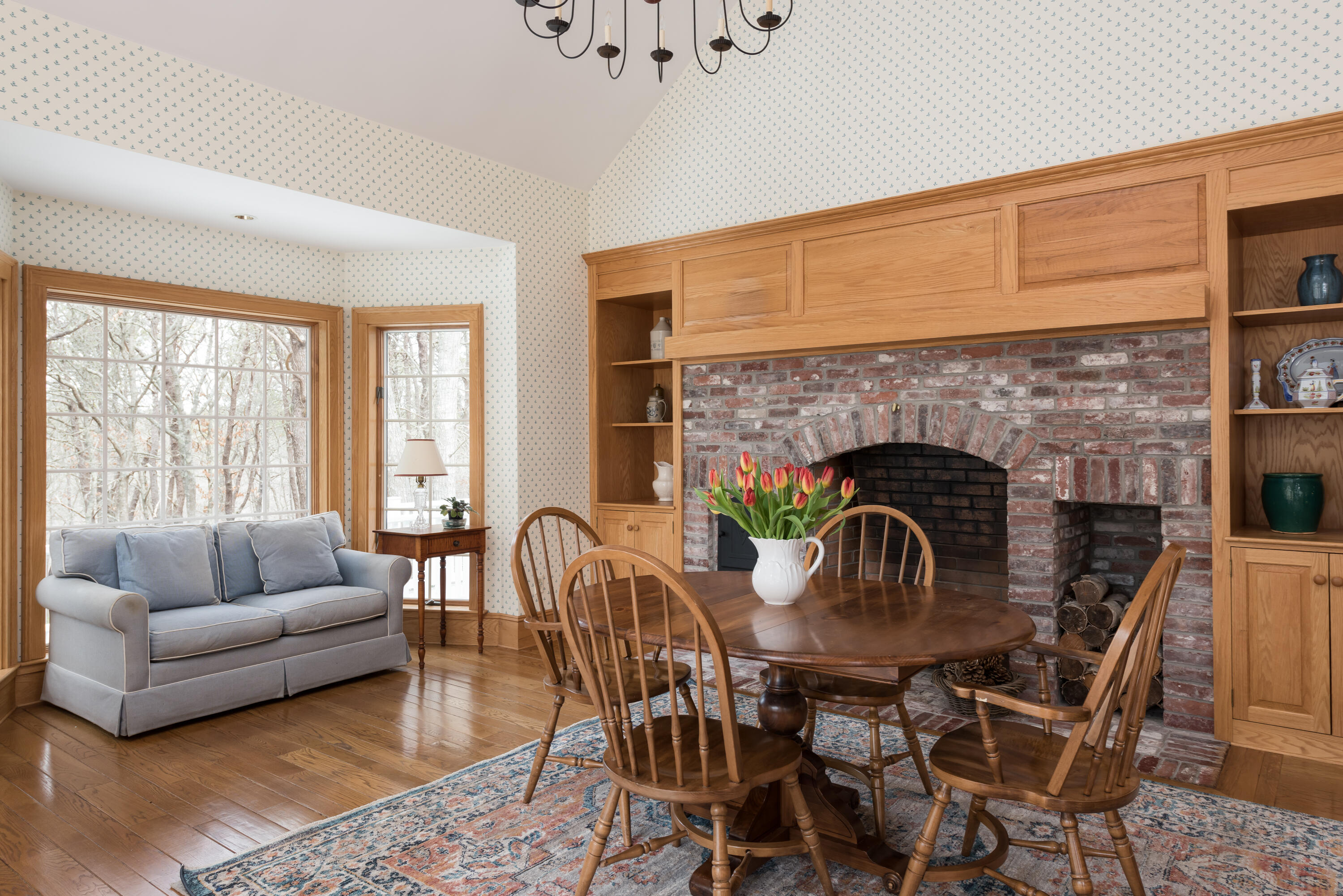 100 Ice Valley Road Osterville, MA 02655 - Photo 10 of 22 a living room with furniture and a fireplace