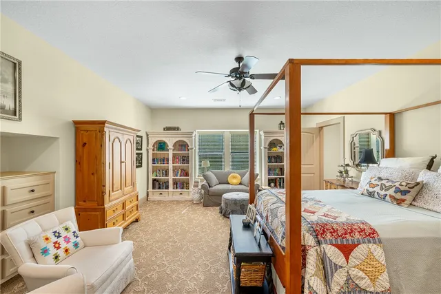 a view of a house with a backyard porch and sitting area