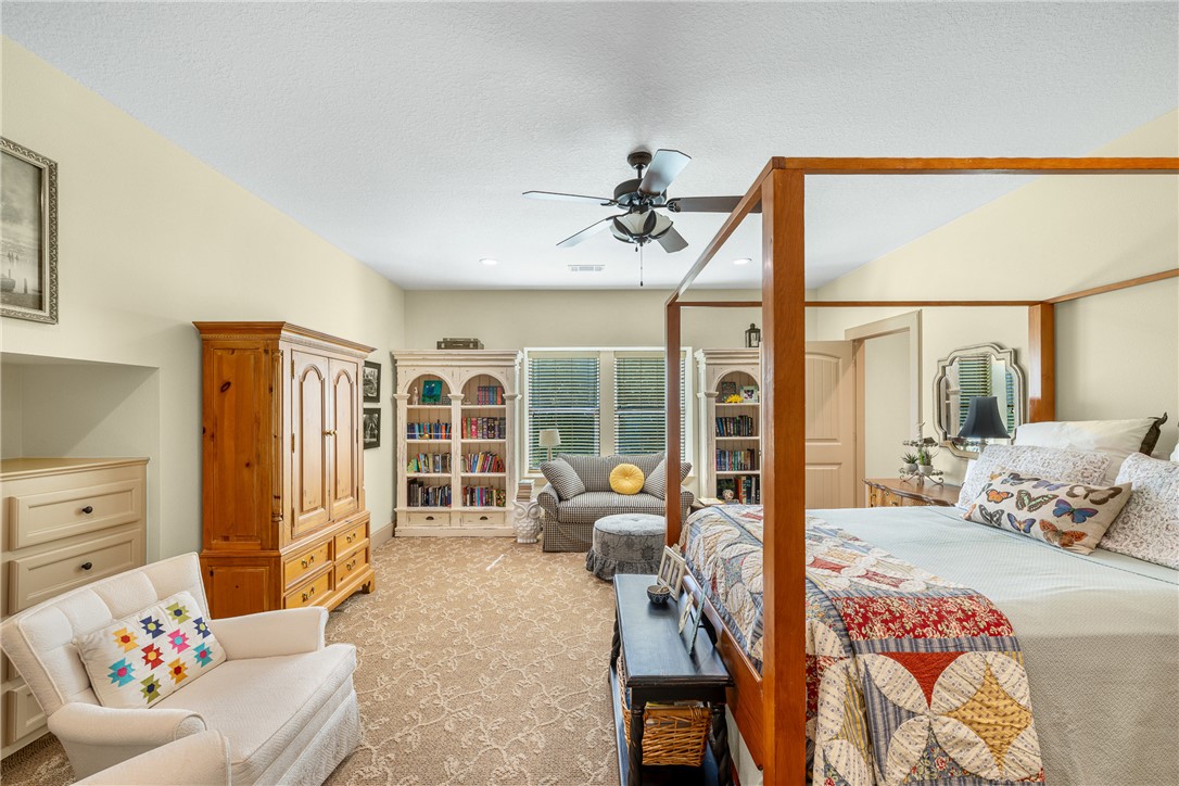 5107 Bovista Ranch Road Navasota, TX 77868 - Photo 14 of 50 a bedroom with furniture and a large window