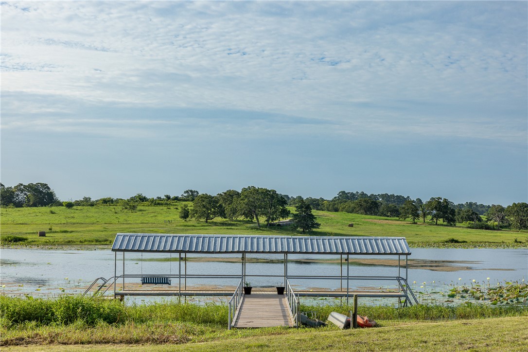 5107 Bovista Ranch Road Navasota, TX 77868 - Photo 28 of 50 a view of a park with a big yard and potted plants