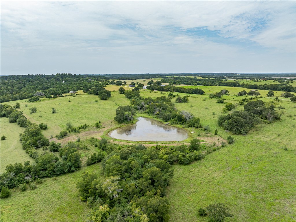 5107 Bovista Ranch Road Navasota, TX 77868 - Photo 34 of 50 a view of a lake with an outdoor space