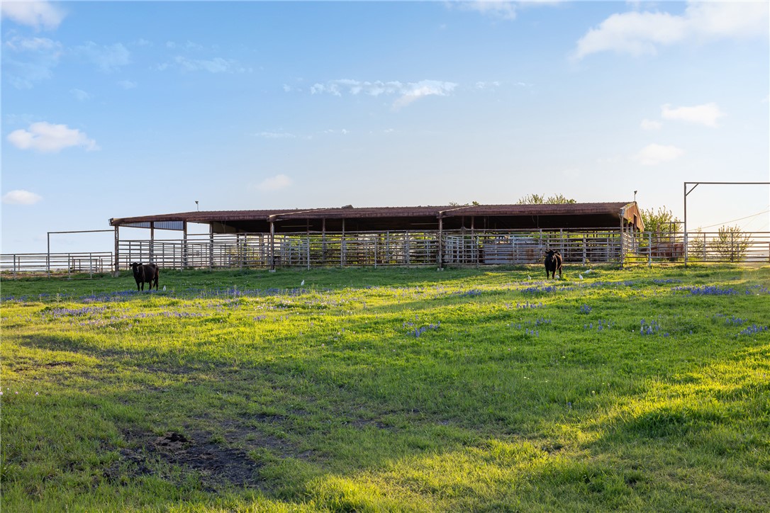 5107 Bovista Ranch Road Navasota, TX 77868 - Photo 43 of 50 a view of a swimming pool with outdoor seating and yard