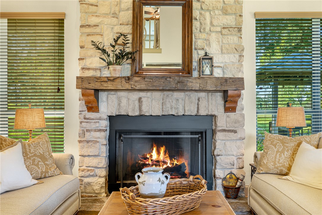 5107 Bovista Ranch Road Navasota, TX 77868 - Photo 8 of 50 a living room with furniture and a fireplace