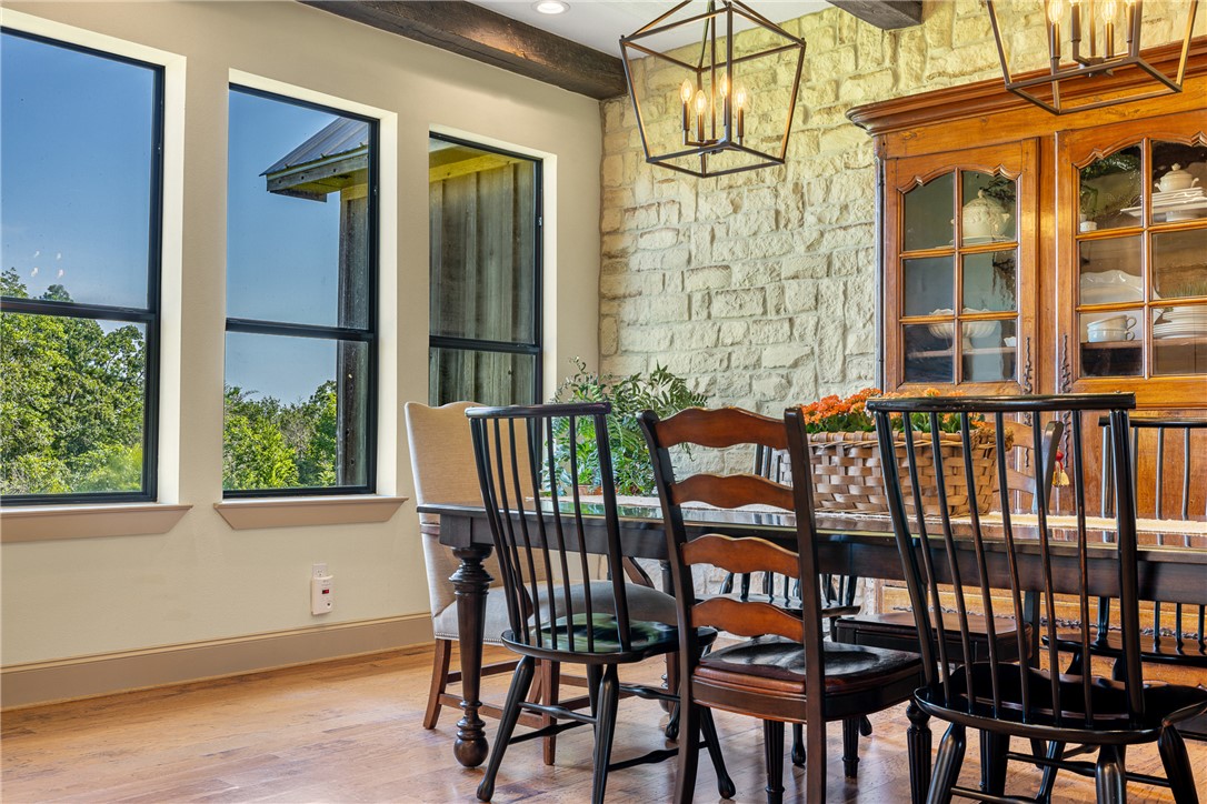 5107 Bovista Ranch Road Navasota, TX 77868 - Photo 9 of 50 a view of a chairs and table in the balcony