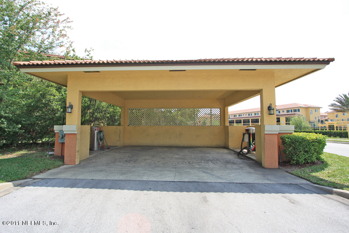 9745 Touchton Road, Unit 2625 Jacksonville, FL 32246 - Photo 14 of 18 a view of a terrace with a outdoor space