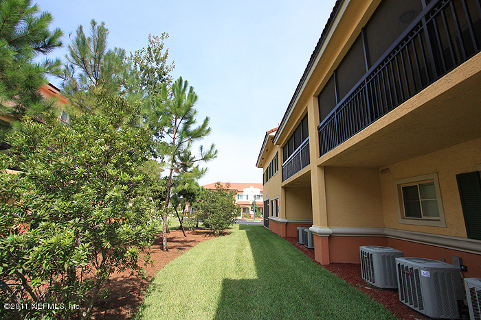 9745 Touchton Road, Unit 2625 Jacksonville, FL 32246 - Photo 3 of 18 a view of an house with backyard space and balcony