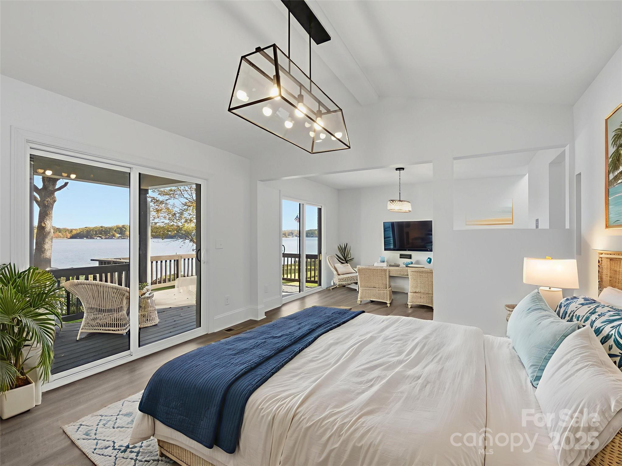 9115 Clement Circle Terrell, NC 28682 - Photo 22 of 48 a bedroom with a large bed and a tv