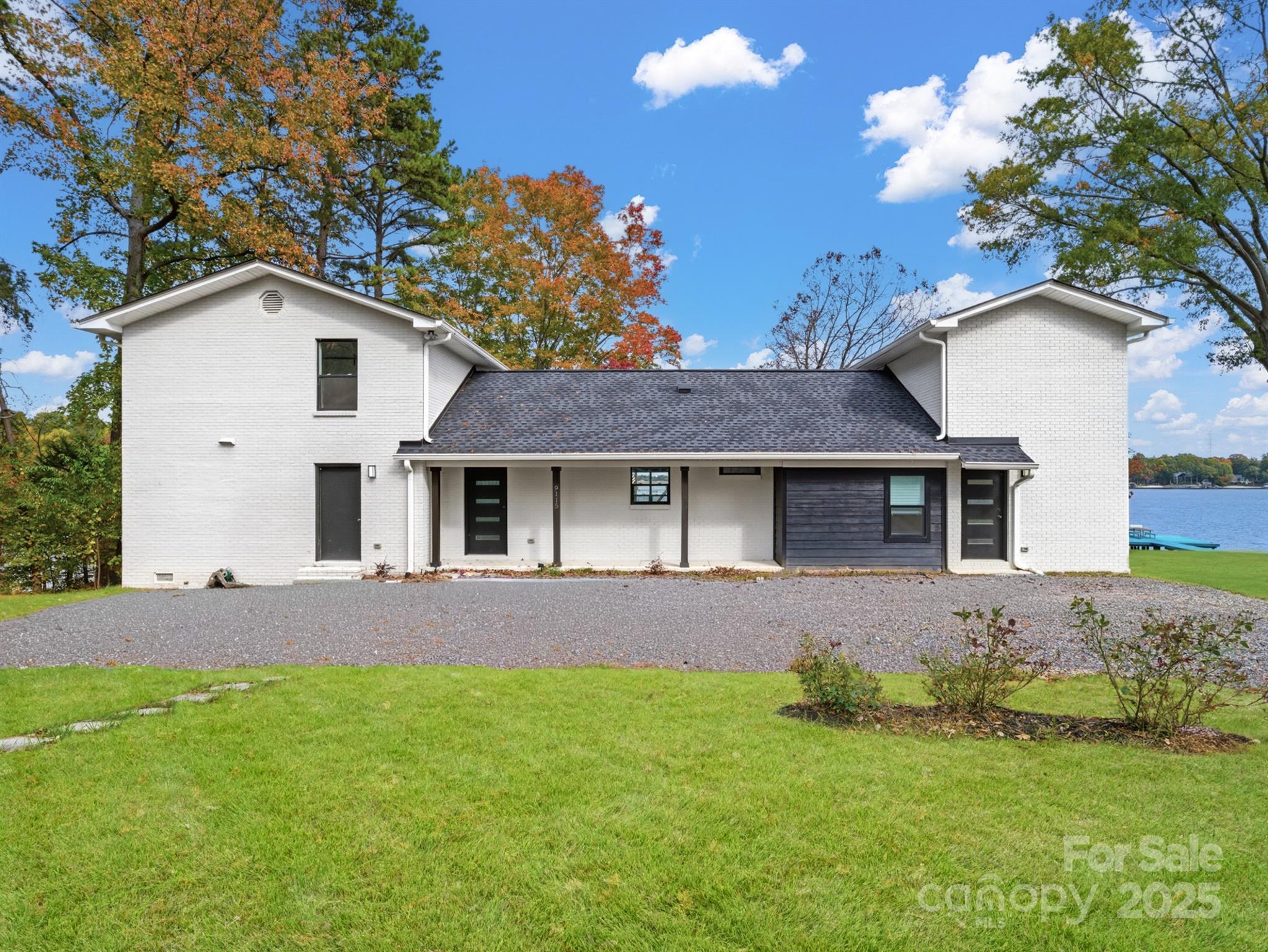 9115 Clement Circle Terrell, NC 28682 - Photo 43 of 48 a front view of a house with a garden