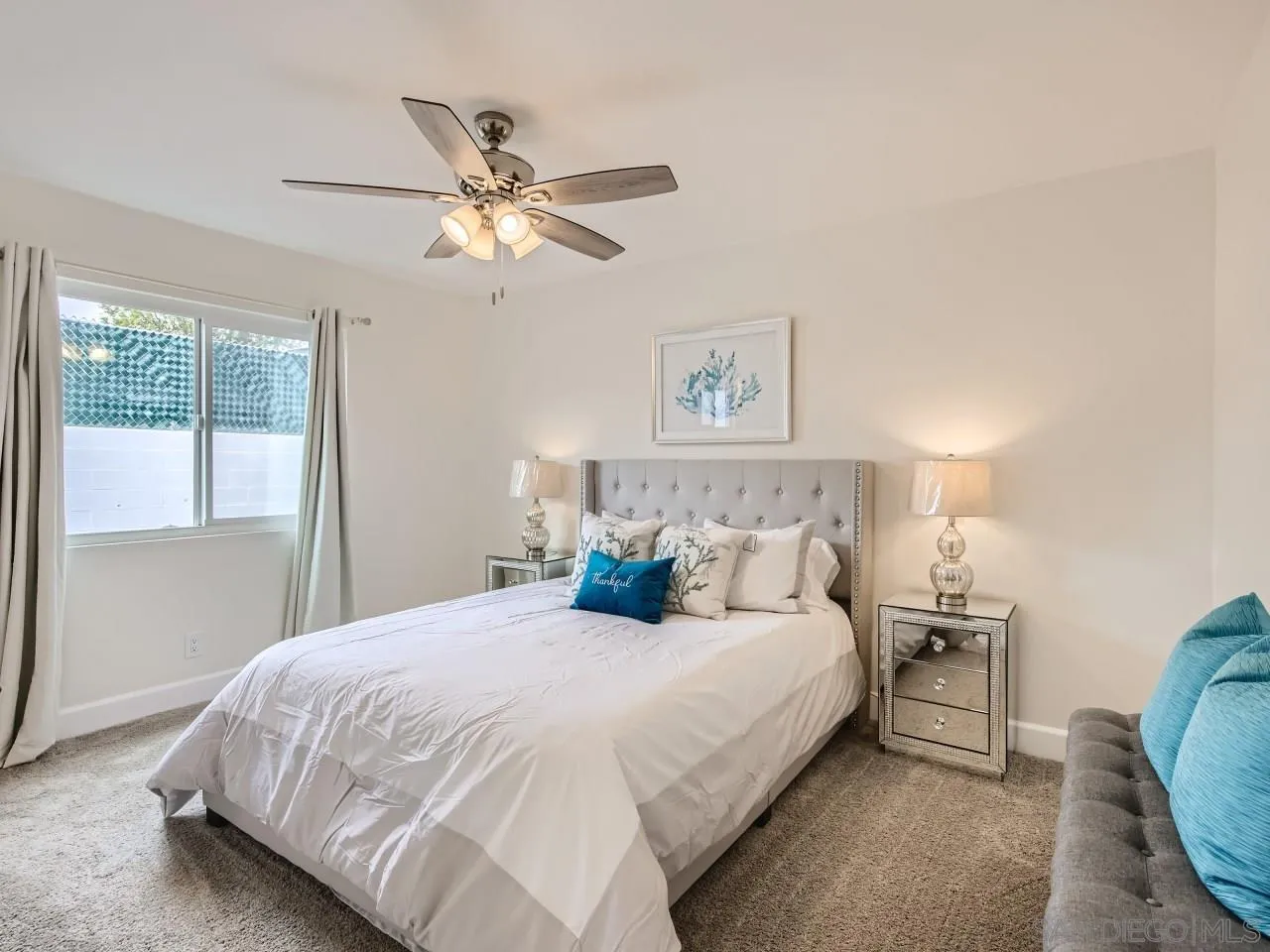 2902 Thunder Drive Oceanside, CA 92056 - Photo 17 of 30 a bedroom with a bed and window