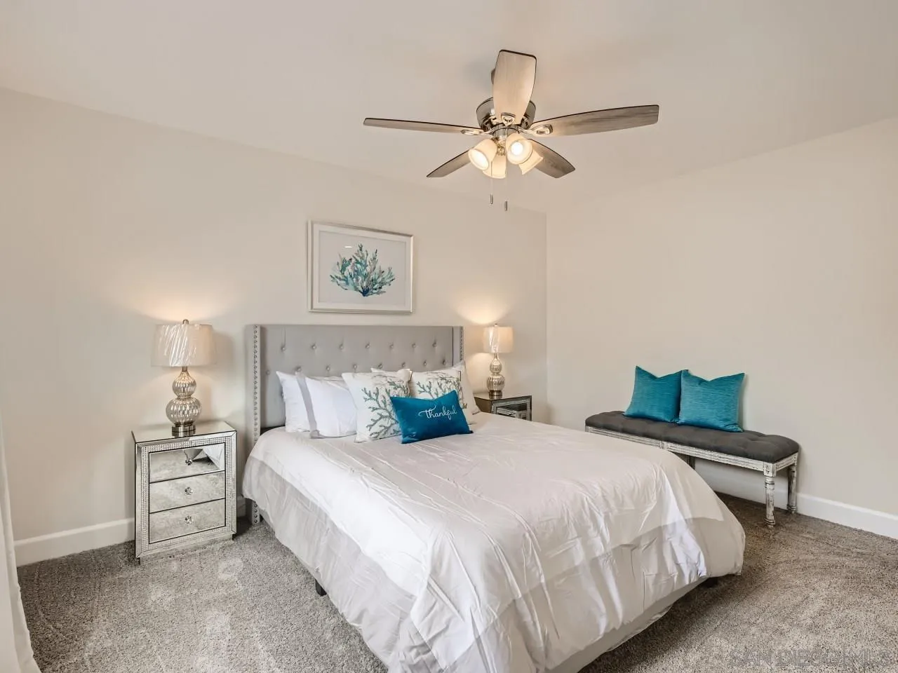 2902 Thunder Drive Oceanside, CA 92056 - Photo 18 of 30 a bedroom with a bed and a chandelier