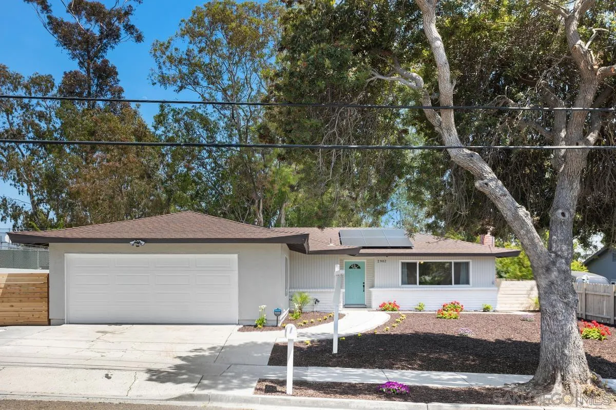 2902 Thunder Drive Oceanside, CA 92056 - Photo 2 of 30 a front view of a house with cars parked