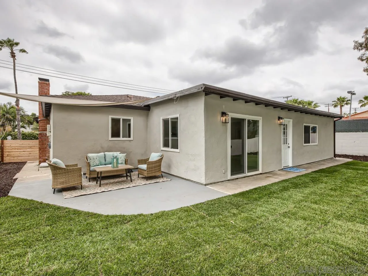 2902 Thunder Drive Oceanside, CA 92056 - Photo 26 of 30 a backyard of a house with table and chairs