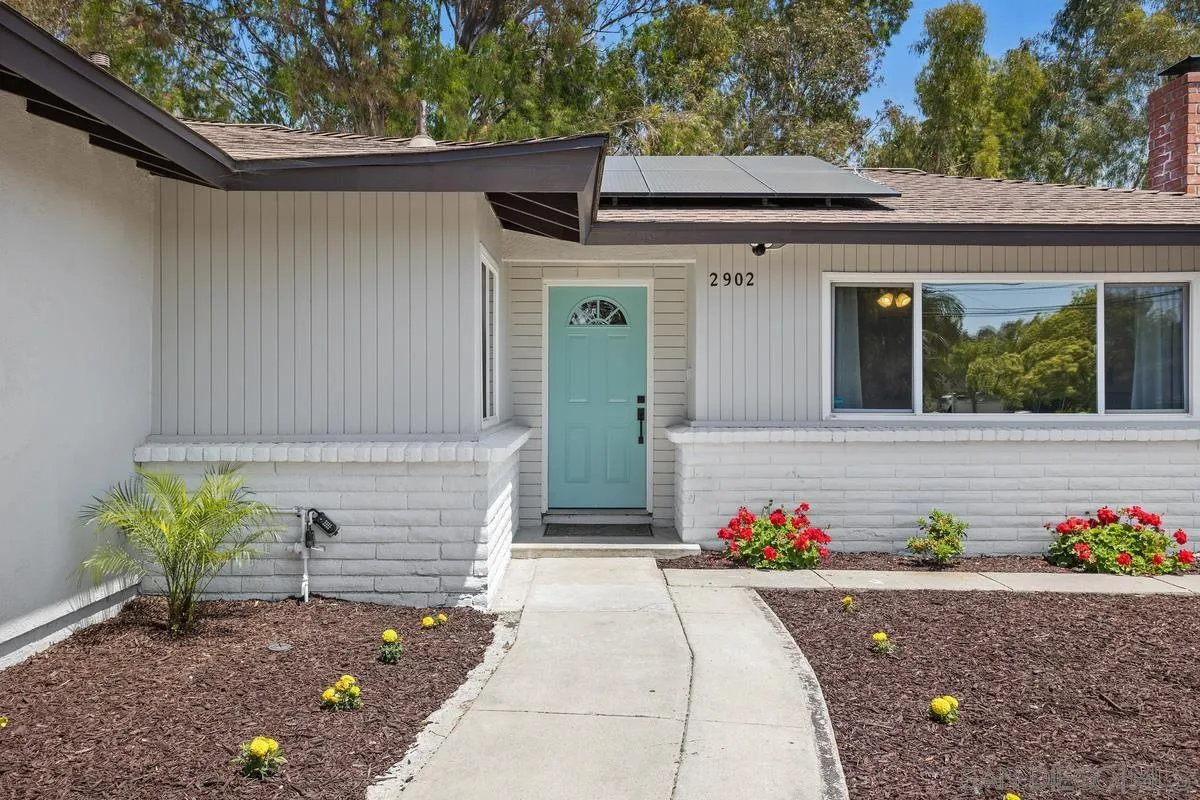 2902 Thunder Drive Oceanside, CA 92056 - Photo 4 of 30 a front view of a house with a yard
