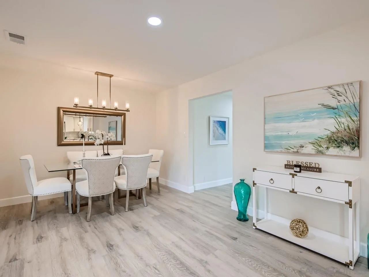 2902 Thunder Drive Oceanside, CA 92056 - Photo 9 of 30 a view of a dining room with furniture and wooden floor