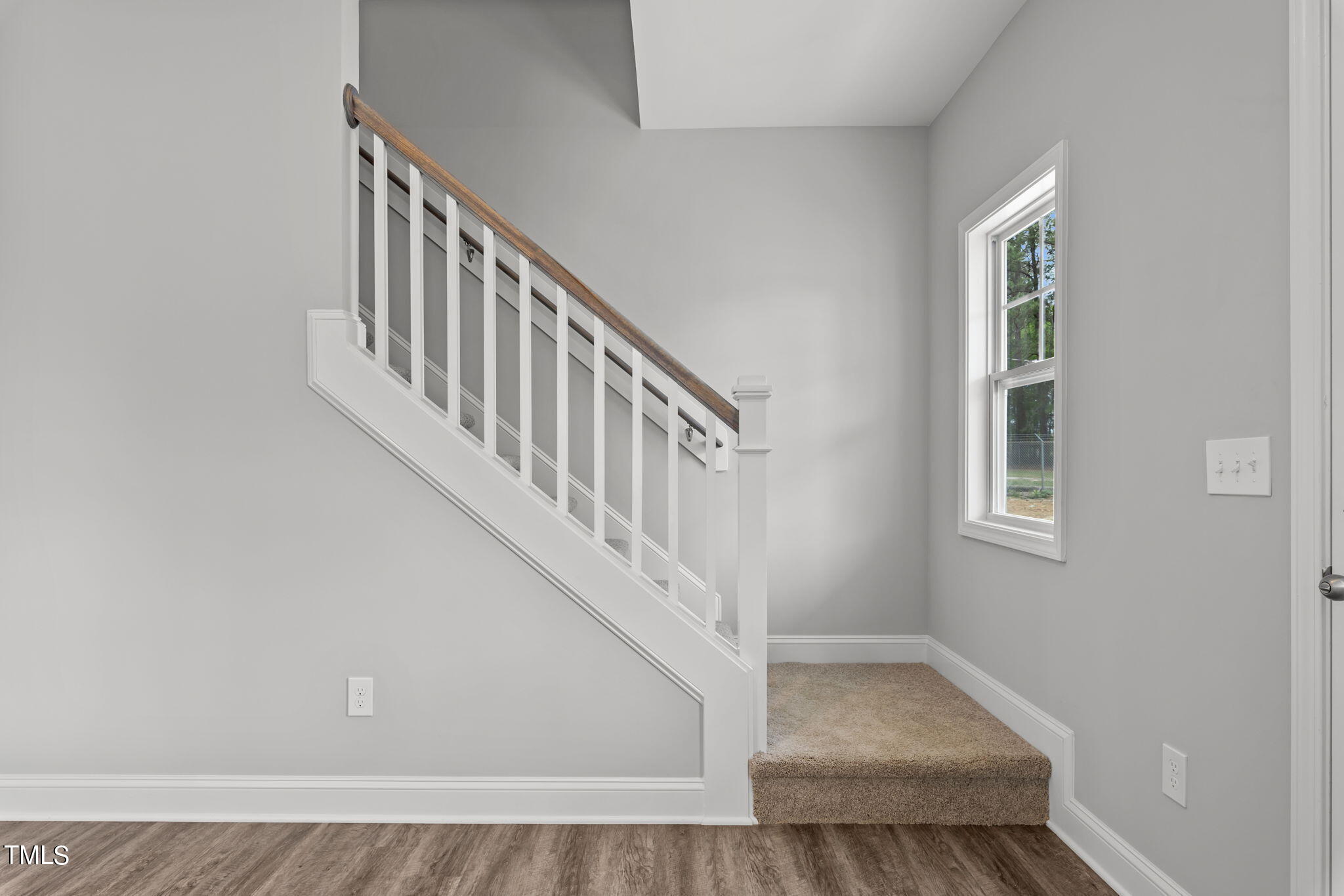 161 Regis Lane Coats, NC 27521 - Photo 16 of 38 a view of entryway with wooden floor