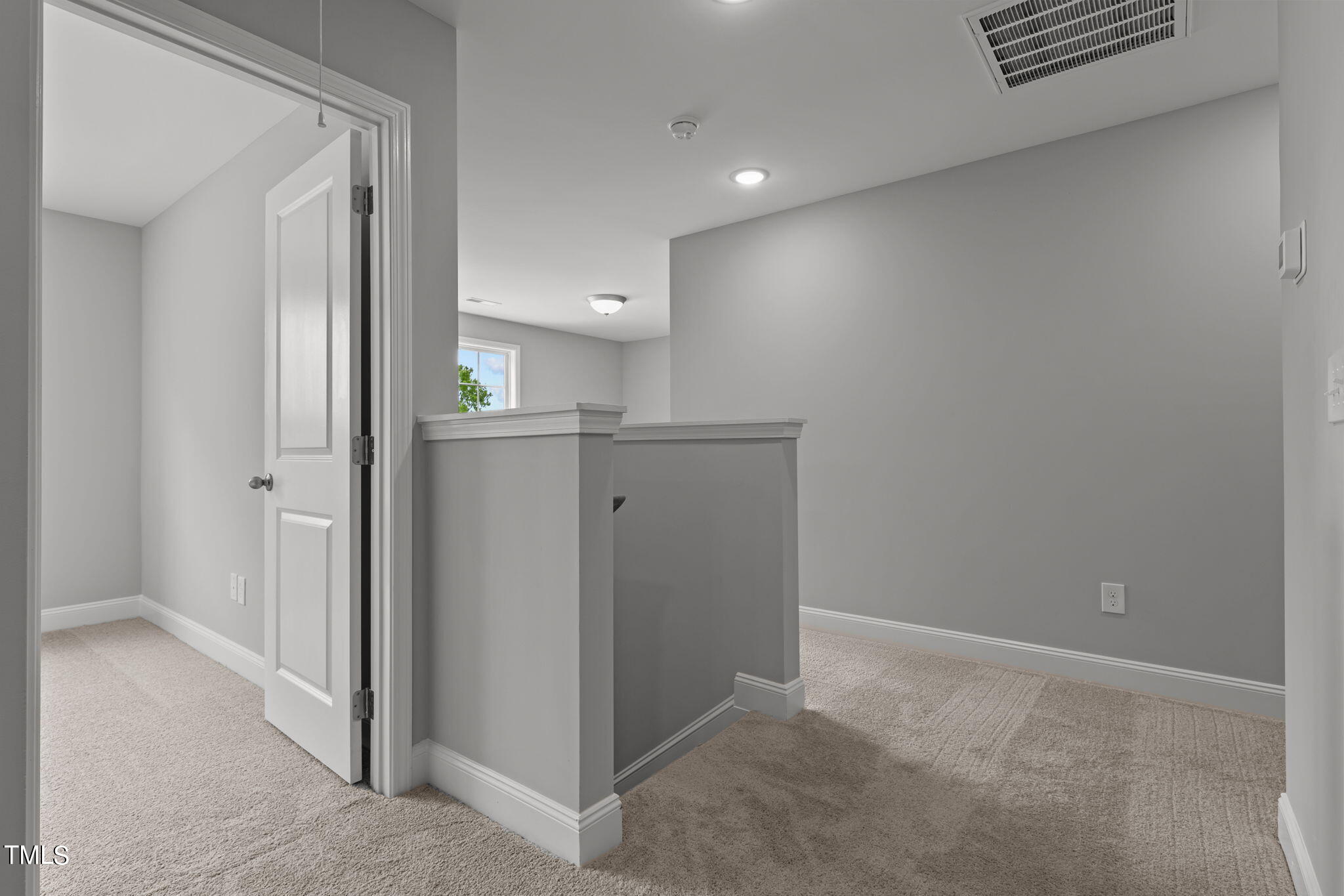 161 Regis Lane Coats, NC 27521 - Photo 17 of 38 a view of a kitchen from the hallway