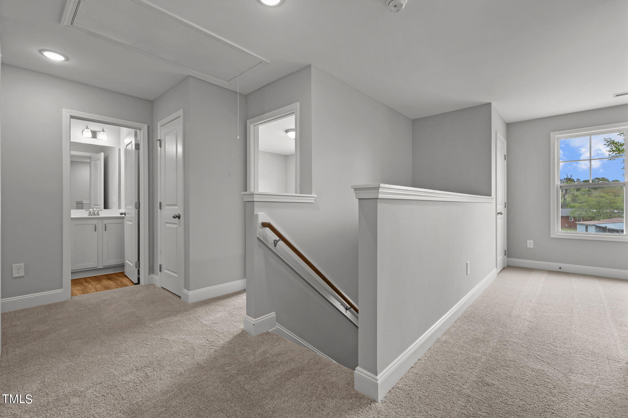 161 Regis Lane Coats, NC 27521 - Photo 18 of 38 a view of a hallway with closet area