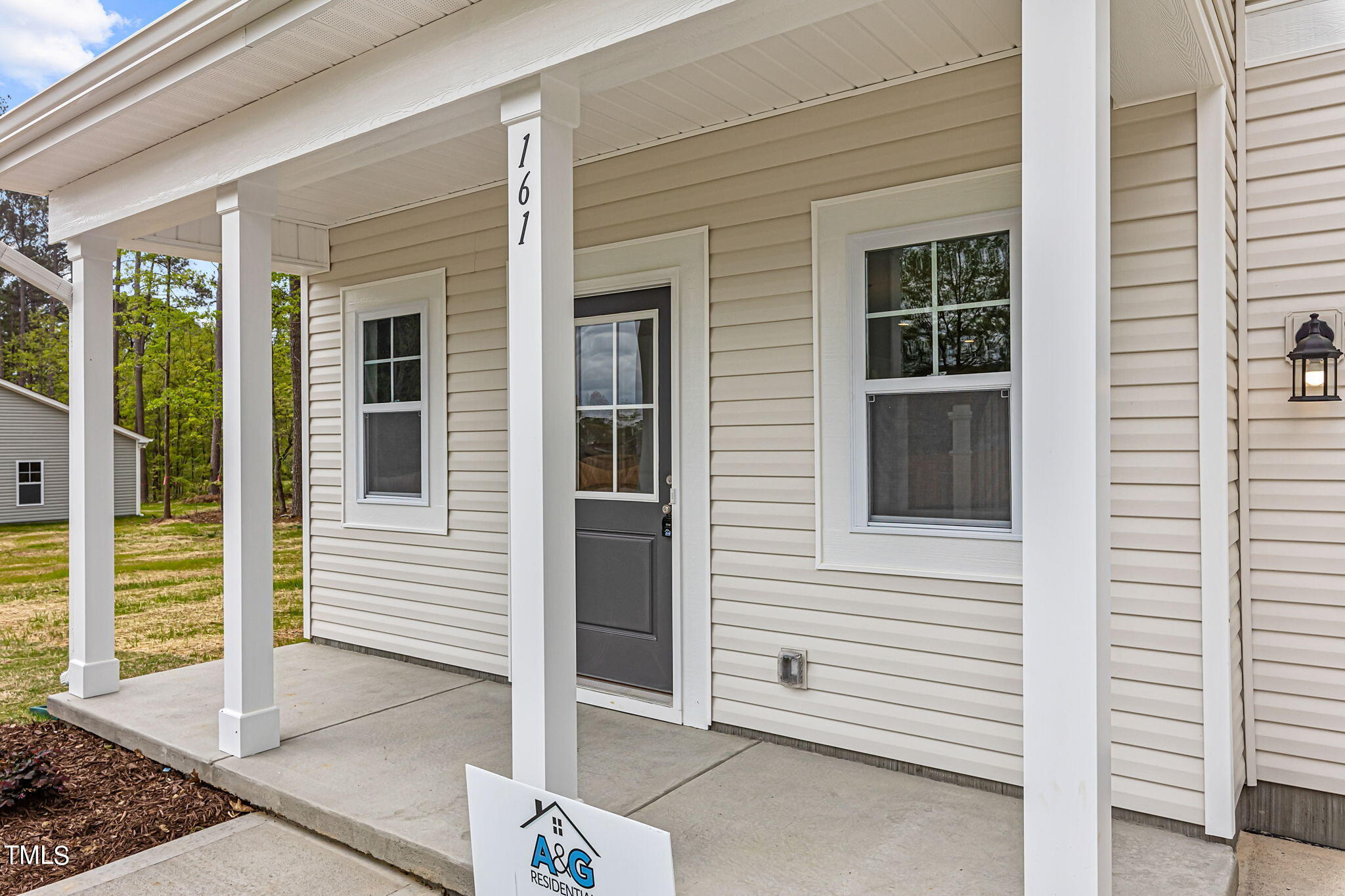 161 Regis Lane Coats, NC 27521 - Photo 2 of 38 a view of a entryway of the house