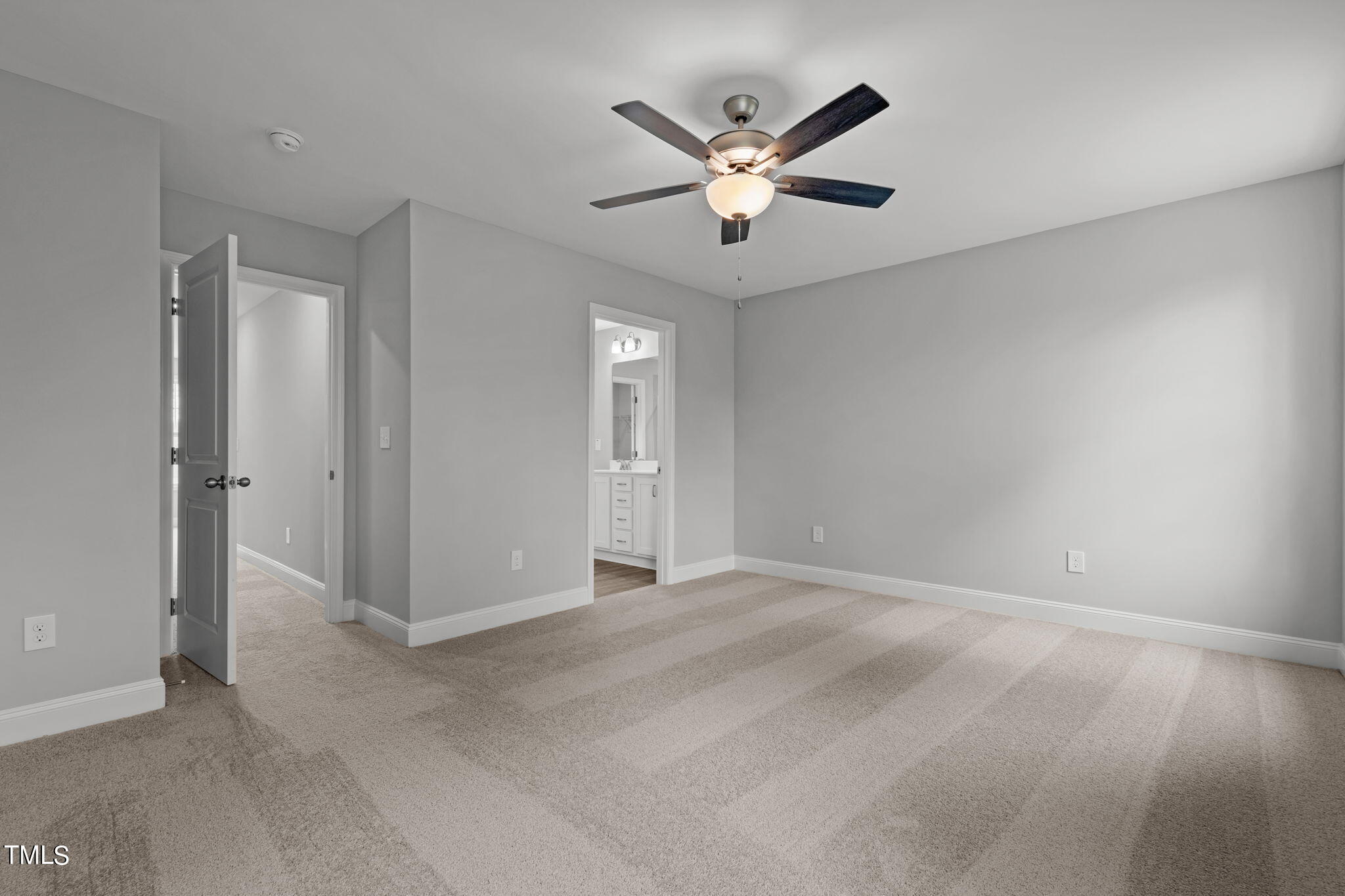 161 Regis Lane Coats, NC 27521 - Photo 25 of 38 an empty room with windows and fan
