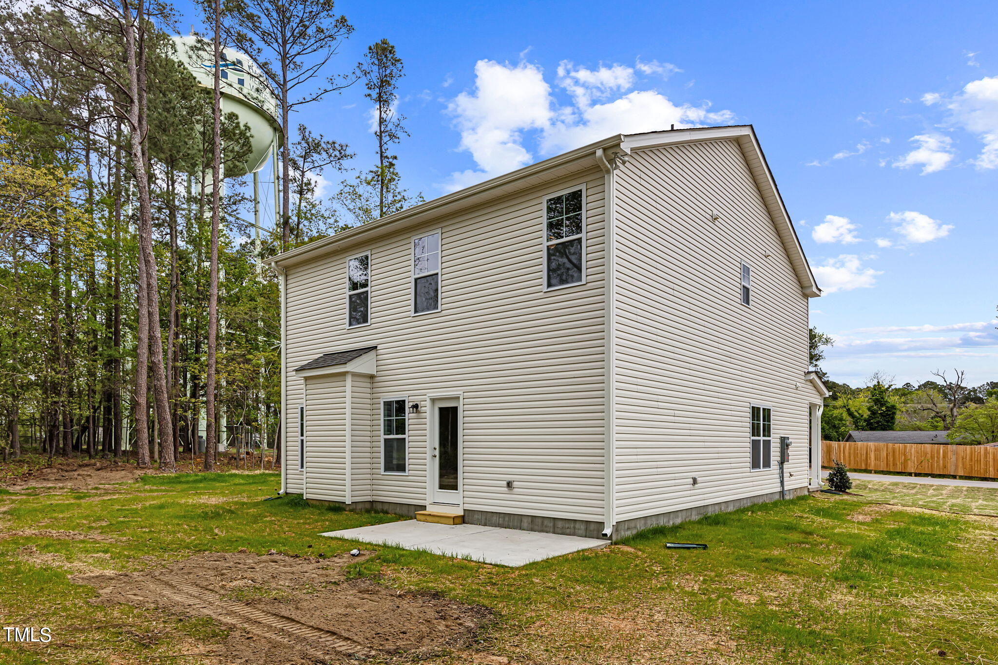161 Regis Lane Coats, NC 27521 - Photo 31 of 38 a view of a house with a yard