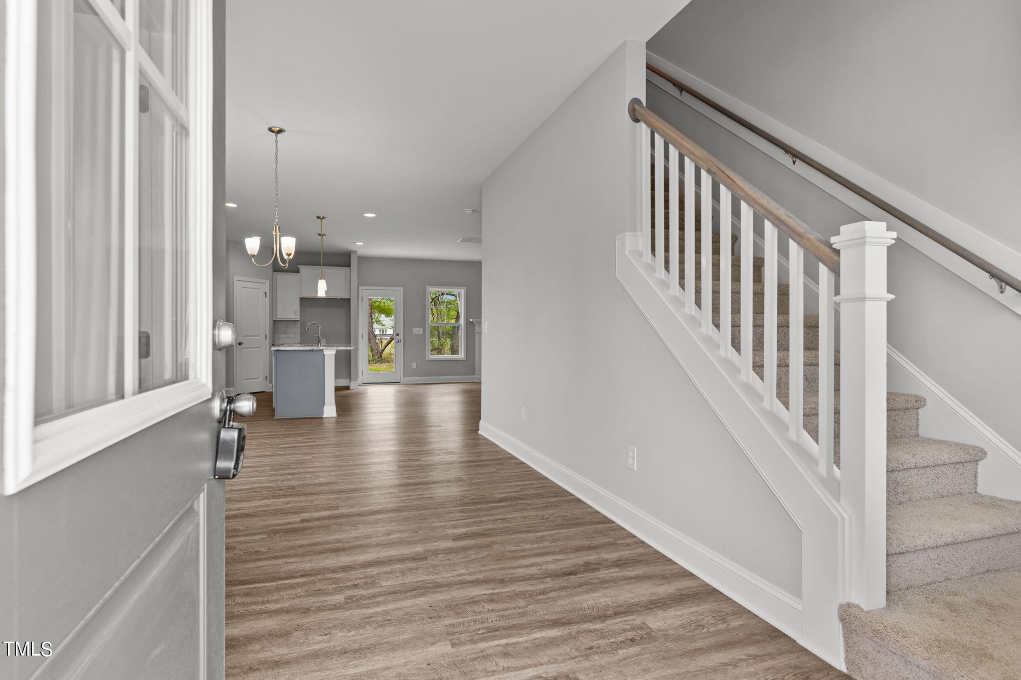 161 Regis Lane Coats, NC 27521 - Photo 5 of 38 a view of an entryway with wooden floor
