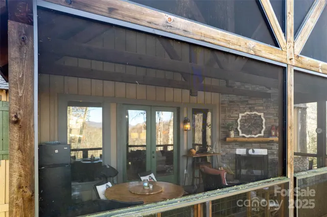 a dining room with a table and chairs