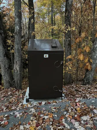 a view of a table and chairs under an umbrella