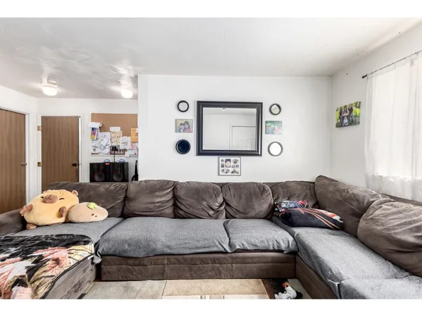 a living room with furniture and a couch