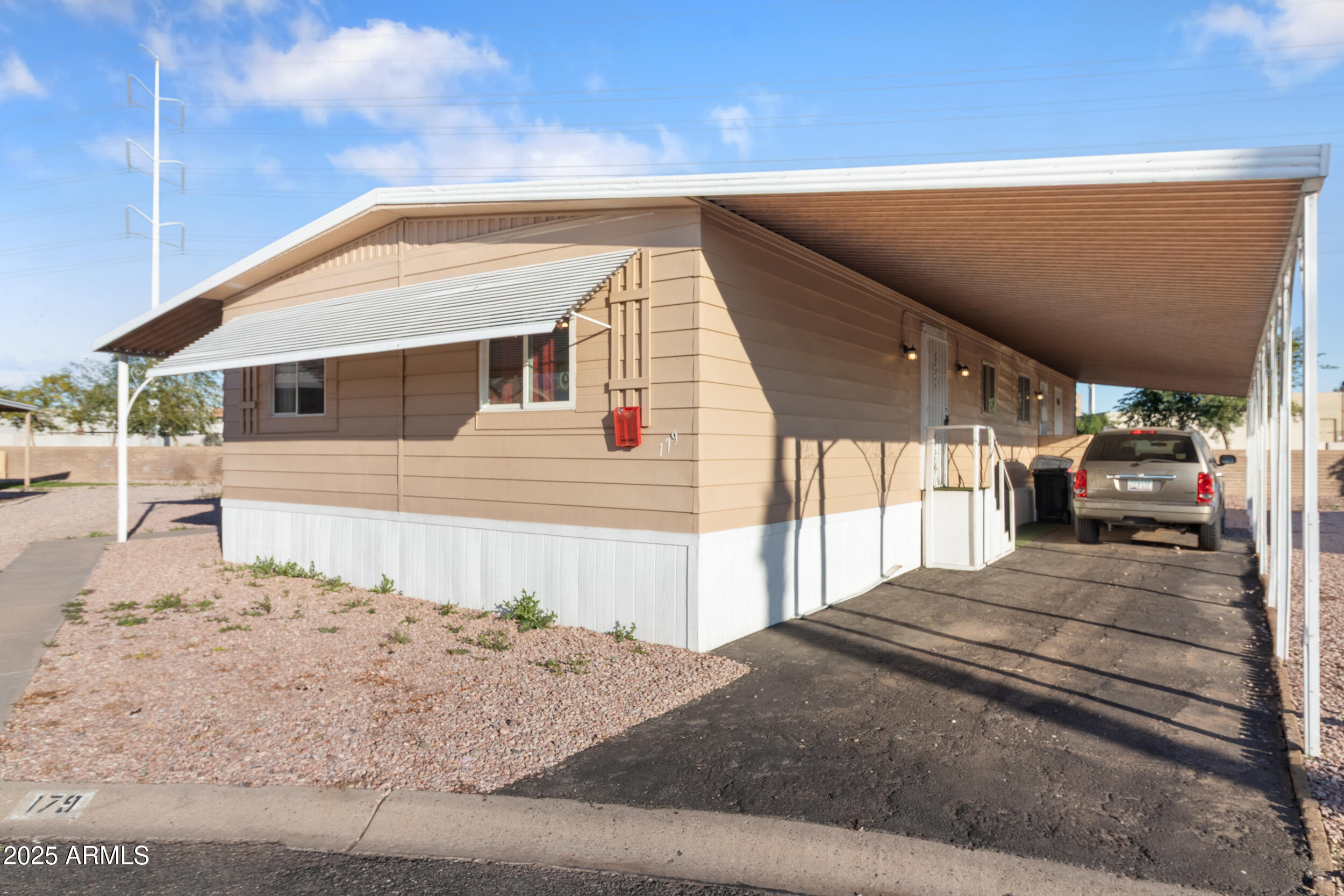 400 West Baseline Road, Unit 179 Tempe, AZ 85283 - Photo 2 of 50 a view of a house with a patio