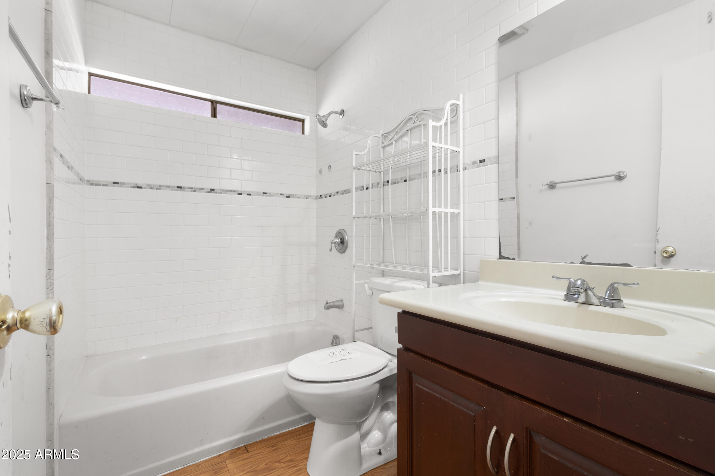 400 West Baseline Road, Unit 179 Tempe, AZ 85283 - Photo 31 of 50 a bathroom with a sink a toilet and shower