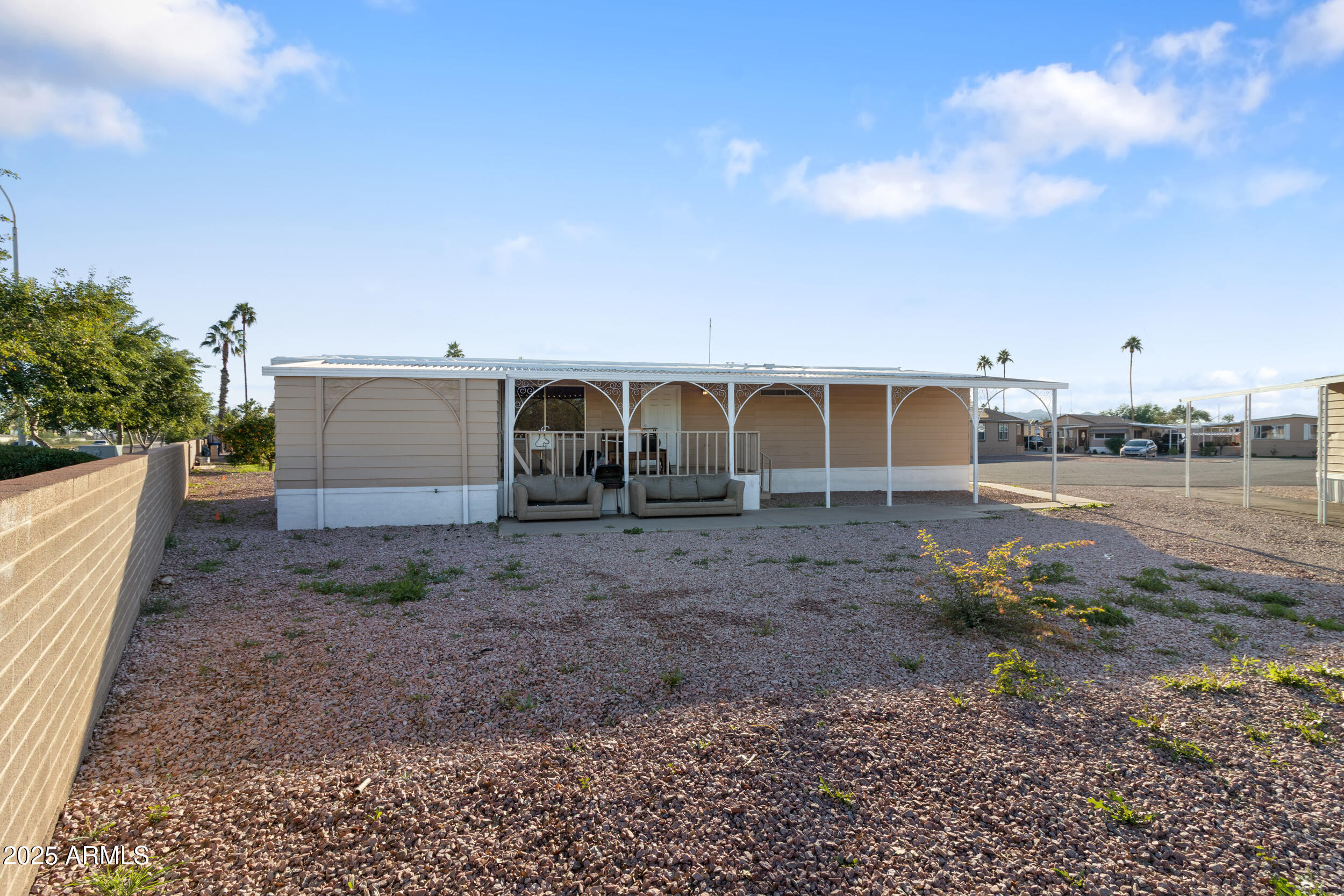400 West Baseline Road, Unit 179 Tempe, AZ 85283 - Photo 33 of 50 a view of a house with backyard
