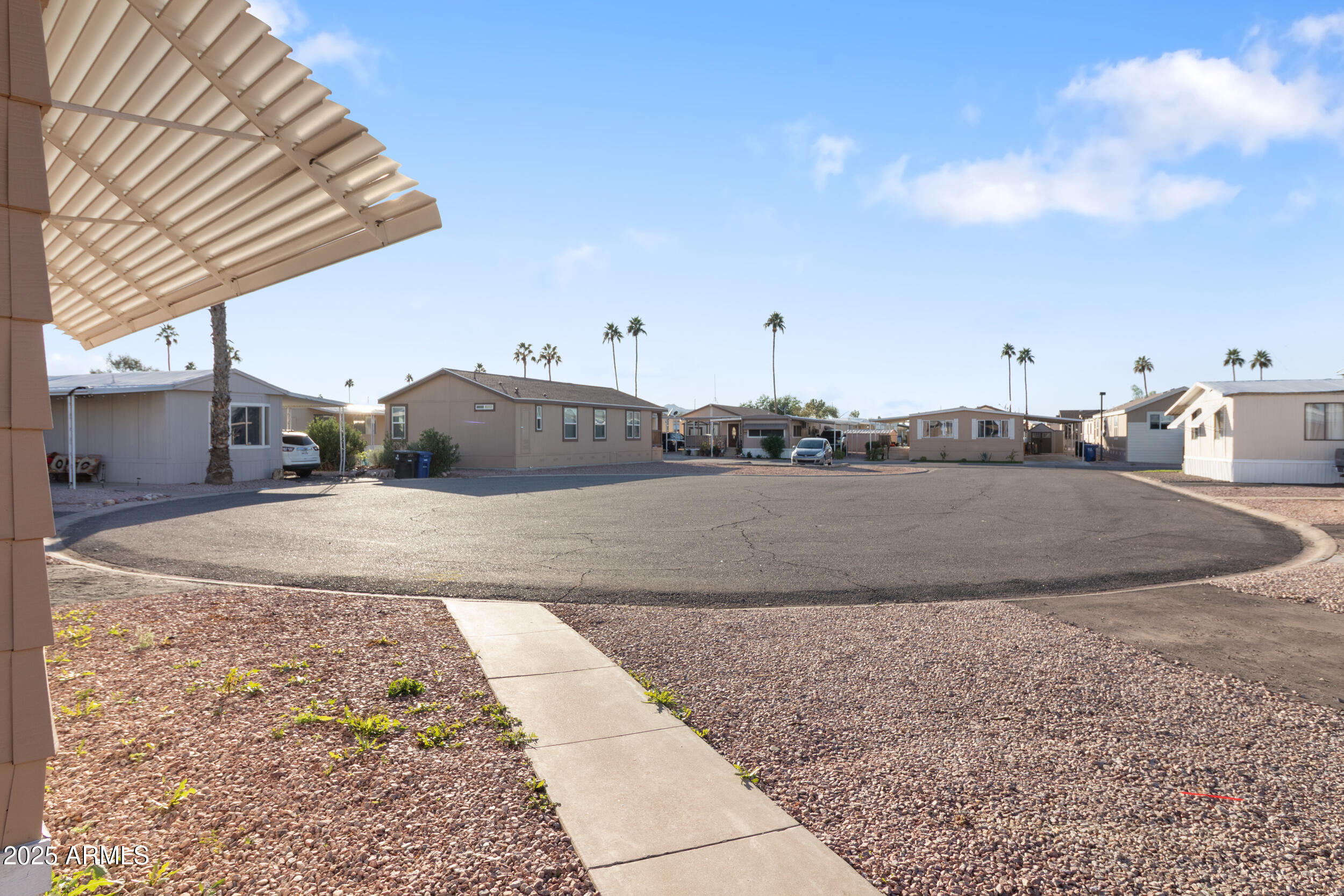 400 West Baseline Road, Unit 179 Tempe, AZ 85283 - Photo 34 of 50 a view of a dry yard with wooden fence