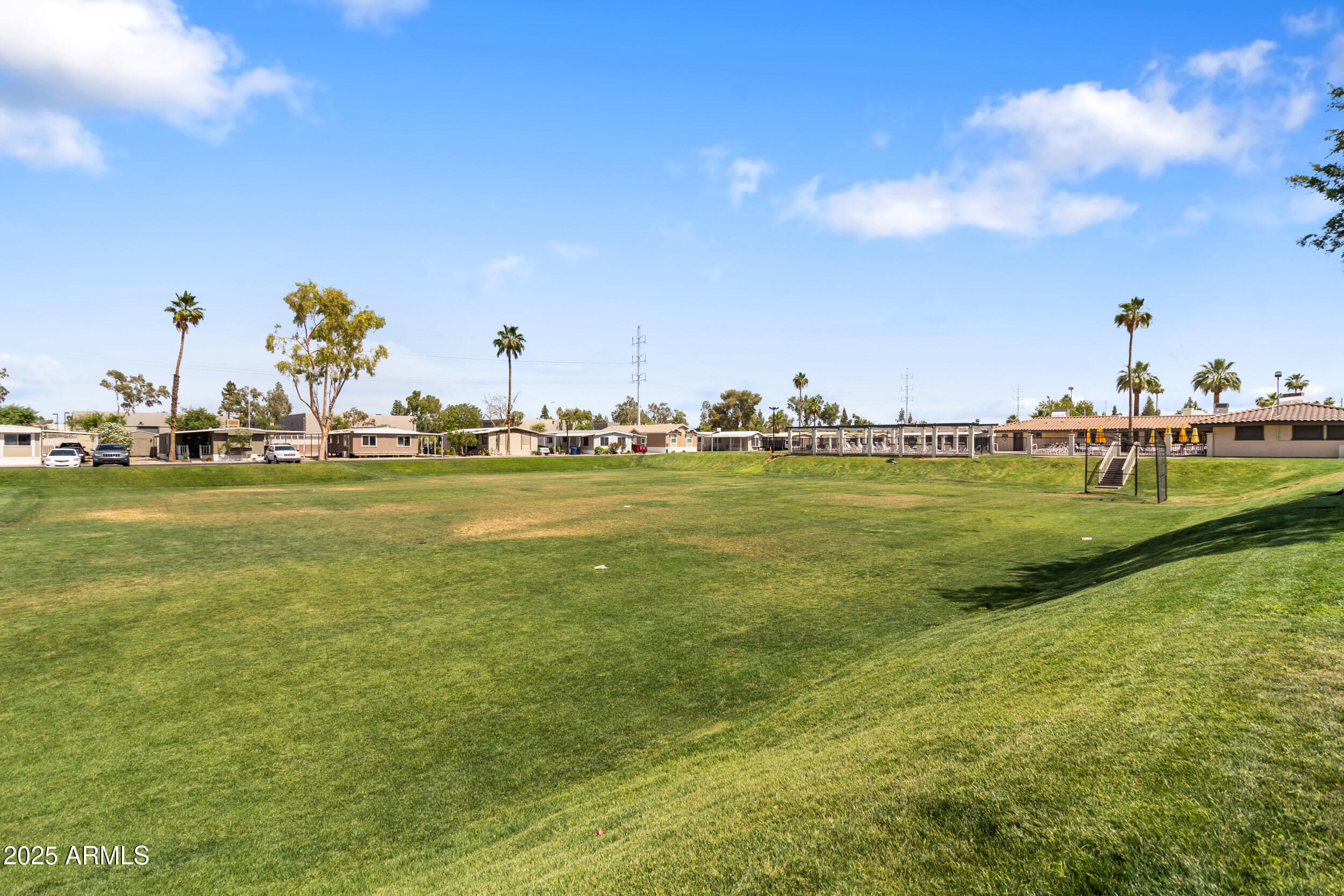 400 West Baseline Road, Unit 179 Tempe, AZ 85283 - Photo 39 of 50 a view of an ocean and houses with outdoor space