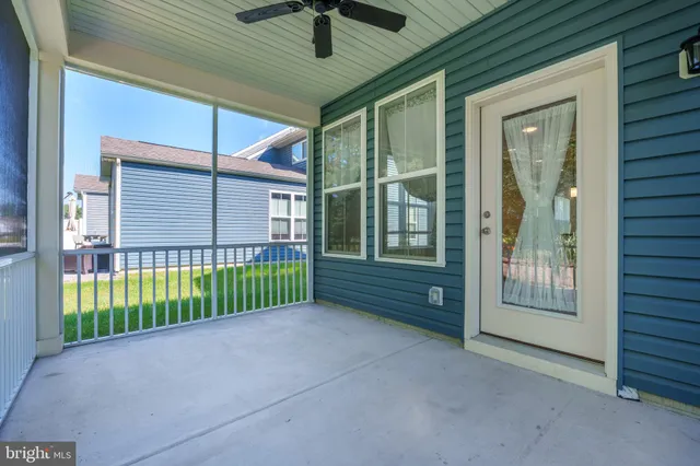 a view of a room with a large window