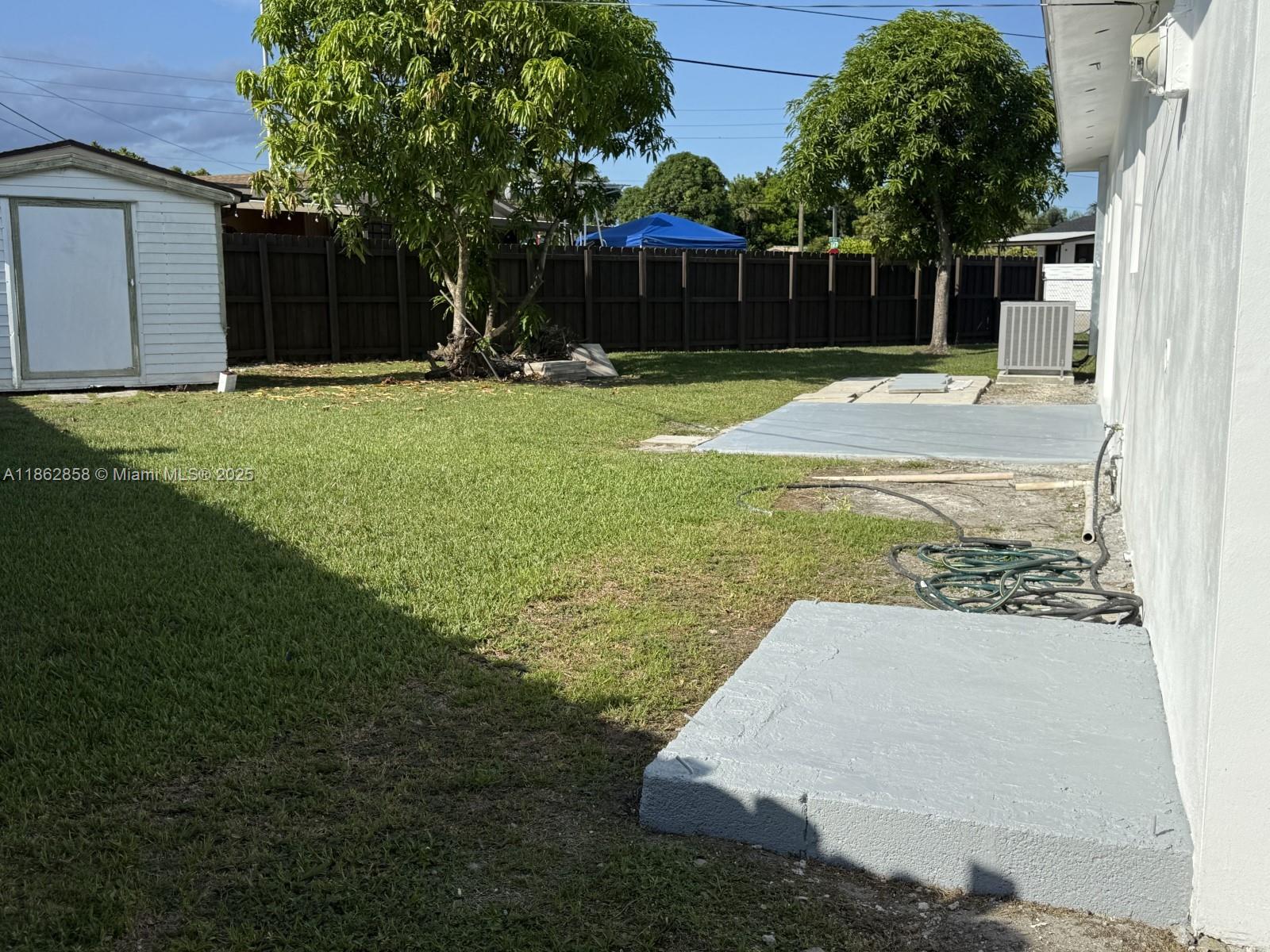 11805 Southwest 185th Street Miami, FL 33177 - Photo 4 of 28 a view of a backyard
