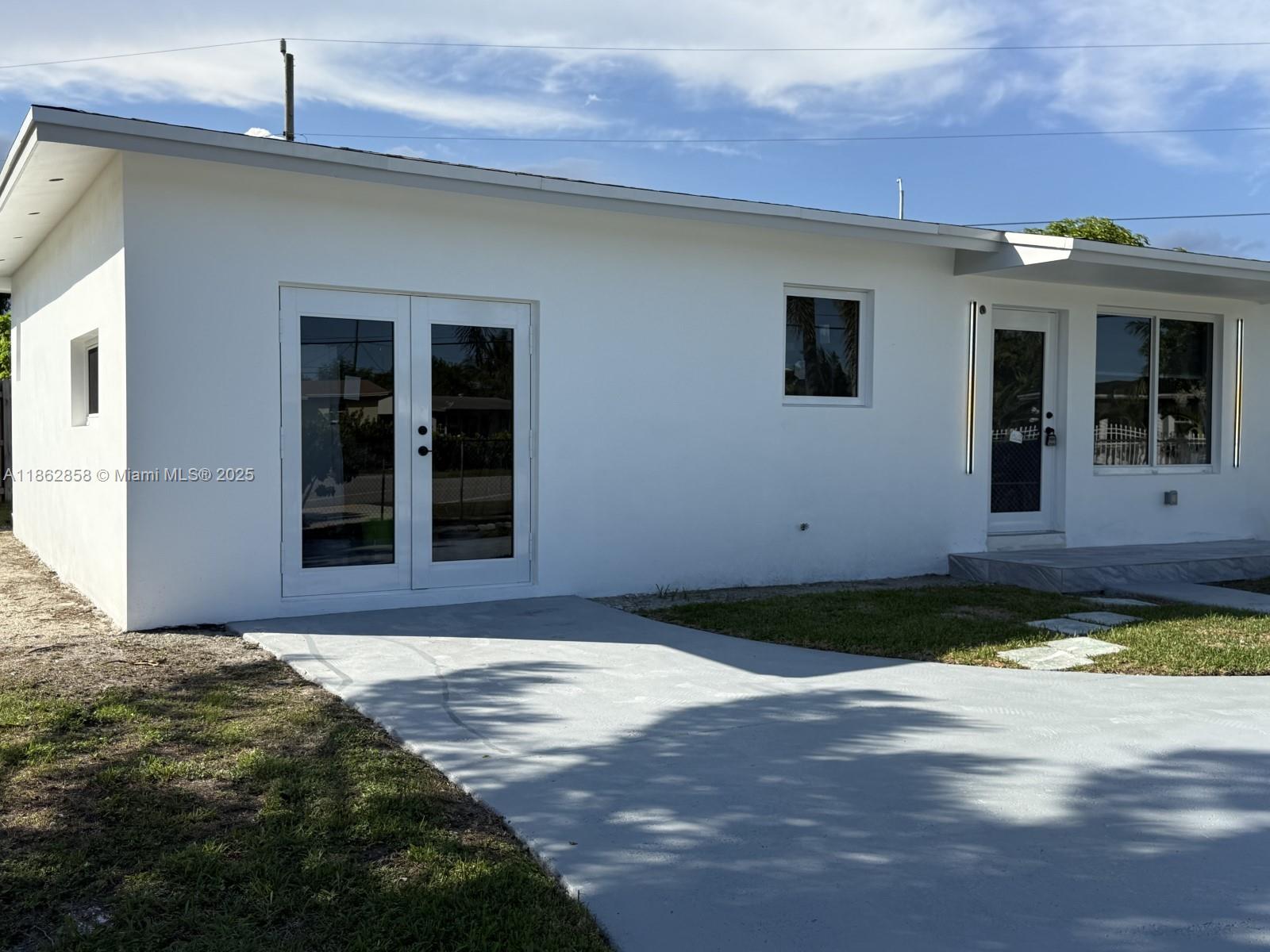 11805 Southwest 185th Street Miami, FL 33177 - Photo 5 of 28 a front view of a house
