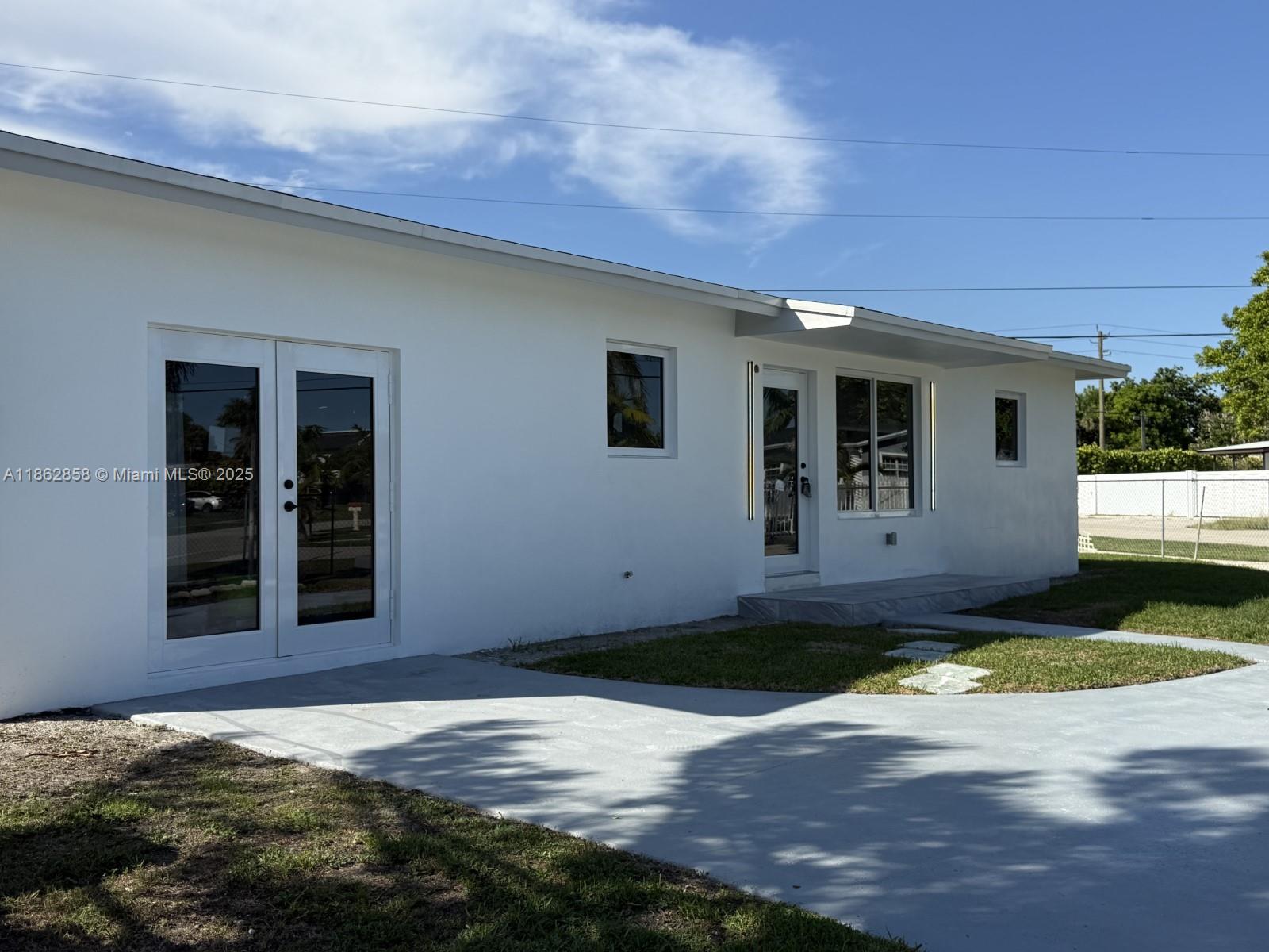 11805 Southwest 185th Street Miami, FL 33177 - Photo 8 of 28 a view of an entrance of house