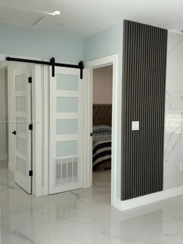 a kitchen with a sink a stove and microwave